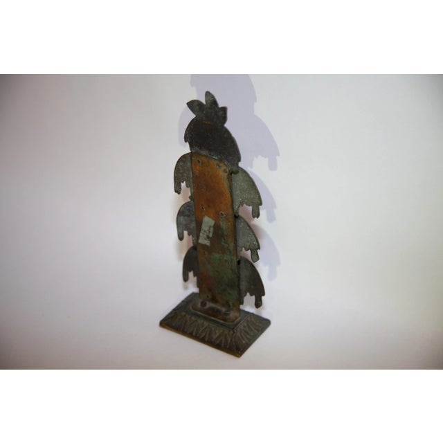 English. Mid 19th century. Brown patina. Bellflower decorations on molded oblong foot. Three (3) slots.