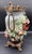 This is a gorgeous 19 century French majolica vase featuring heavily adorned with large heavily adorned flowers and is...