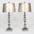 A pair of Mid-Century Modern composite geometric form lamps in silver, with silver gilt shades. Interesting geometric...