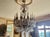 Purchased this 24-light chandelier at the renowned French Antique Shop in New Orleans. Check out their website -...