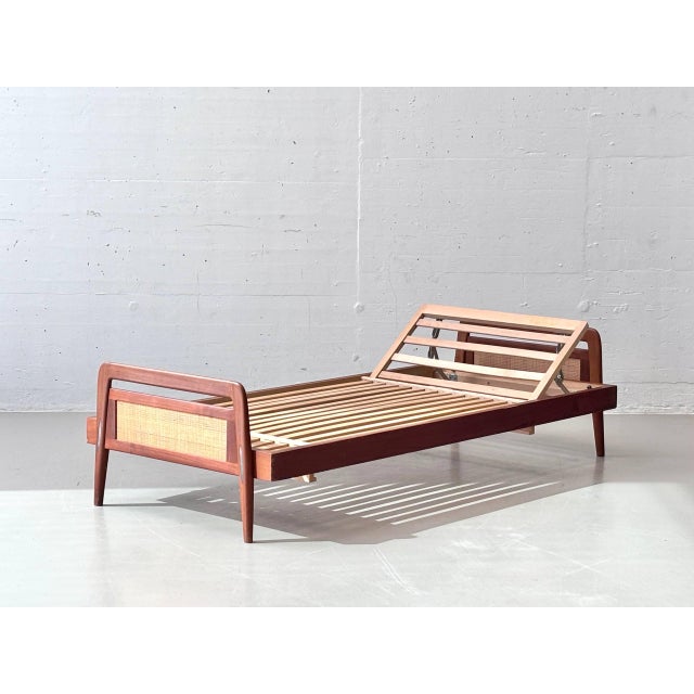 An elegant mid-century bed by the swiss manufacturer swiss form, crafted in the 1950s. This bed combines scandinavian-...