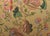 Custom-tailored pillow by Mike Seratt of The Prized Pig in a designer fabric depicting a botanical floral linen-print...