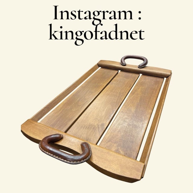 A Rare French Midcentury Modern hand stitched leather service tray by Jacques Adnet, circa 1955. Adnet had a rare talent...