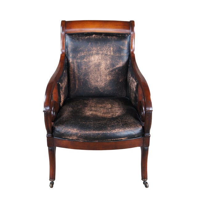 Rare vintage Henredon Furniture Jockey club / lounge / library / office elbow arm chair. Made of mahogany featuring Empire...