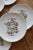Lovely vintage set of porcelain cheese plates. They feature a delicate polychrome pattern of France and its cheese...