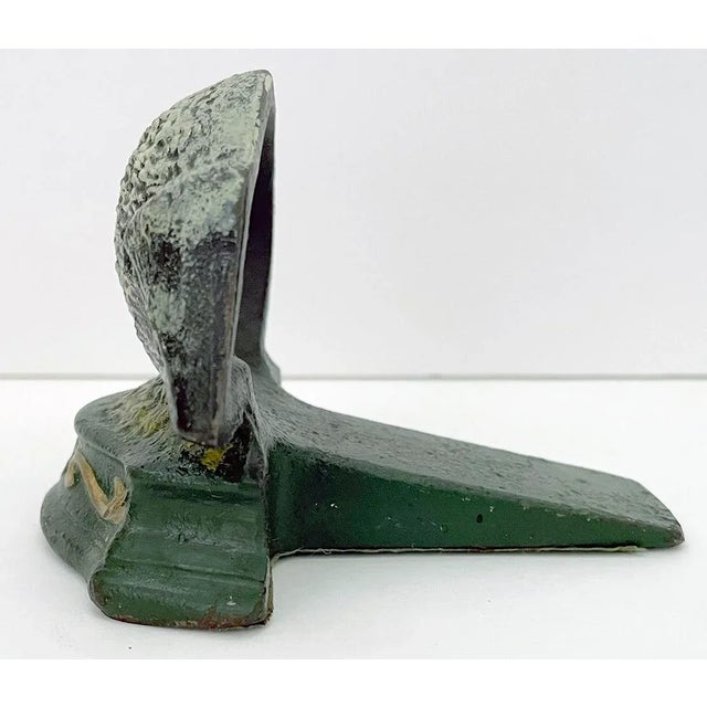 Vintage wedge style painted cast iron doorstop. Be it a Woodchuck, Groundhog or Nutria its ready to keep the door open for...