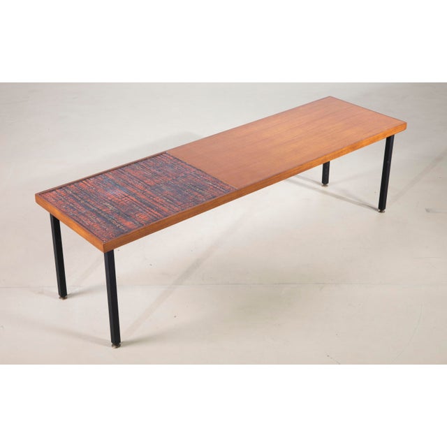 An exceptional and culturally significant mid-century modern coffee table (tavolino da fumo), dating to the late 1950s or...