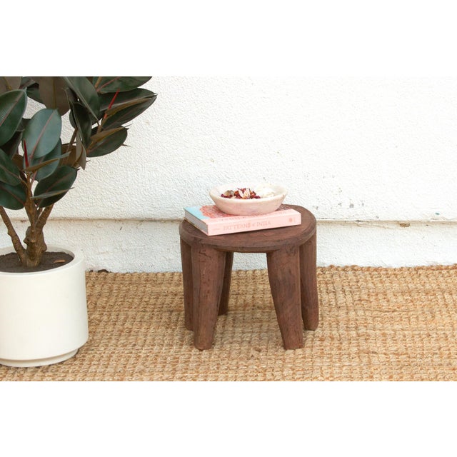 A unique piece of African art, this vintage Nupe table from Nigeria is a must-have for collectors and enthusiasts of Nupe...