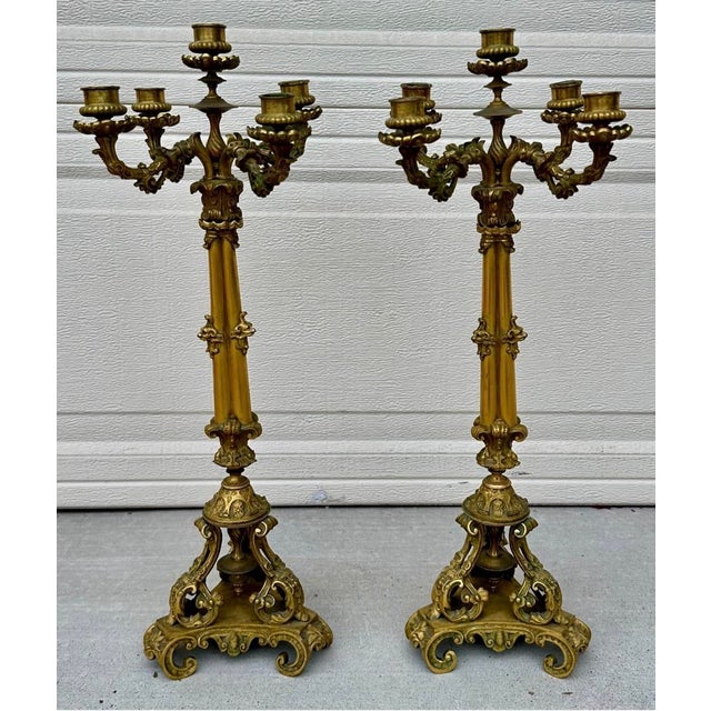 Exceptional Pair of French Restoration Period Gilt Bronze 5-Light Candelabras France, circa 1830 A rare and highly...