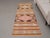 Vintage Hand-Knotted runner rug is a semi-antique vintage area rug. The '70s Eastern region of Anatolia's unique rug is...