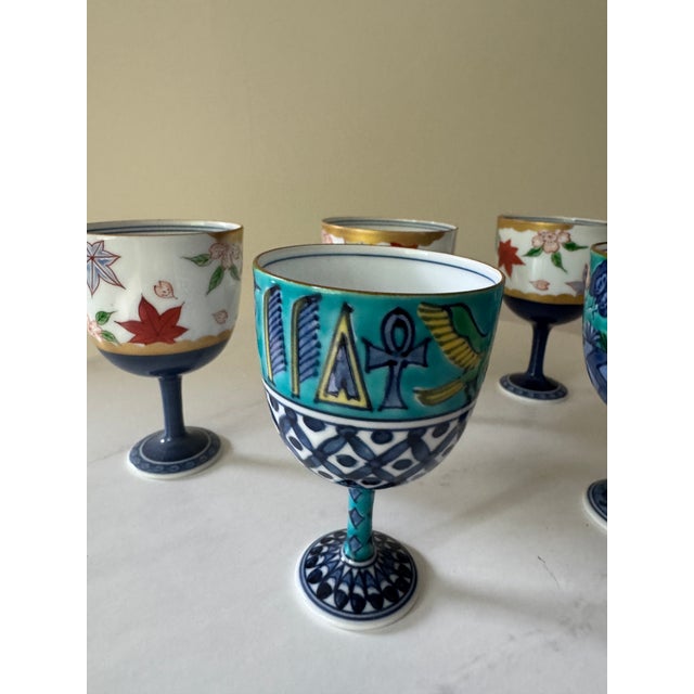 Japanese Mid 20th Century Set of 5 Japanese Porcelain Footed Sake Goblets — Hand-Painted, Arita Style — Autumn, Garden & Egyptian Motifs For Sale - Image 3 of 8