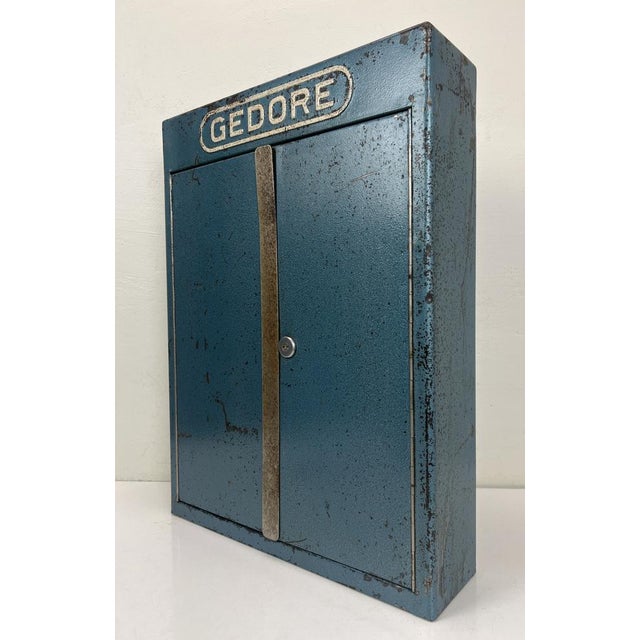 A Craftsman style tool organizer that can be mounted on the wall. The authentic blue color and the oval emblem date from...