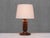 This sculptural table lamp was produced in France in the 1950s. The rustic and elegant design is attributed to Charles...