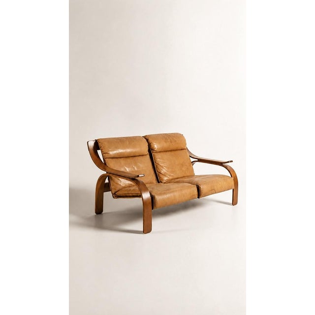 Woodline sofa, Marco Zanuso for Arflex, 1962. Bentwood frame, original cognac leather, period patina. One of the...