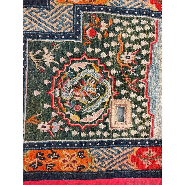 Antique Chinese Small Scatter Size Wool Green Rug, Circa Date: 1920s. This exquisite Chinese textile, likely woven as a...