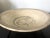 A shallow ceramic bowl from Sukhothai period of Thailand circa 14th-15th century. The dish was hand molded with a coarse...