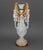 Louis XV Style Gilt Metal and Cut Crystal Candelabrum, with four branches surrounding a central candleholder. 20.75" H x...