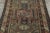 Hand-knotted in wool, this 4x5 Antique Caucasian rug, circa 1890–1899, features stacked geometric medallions, shield...