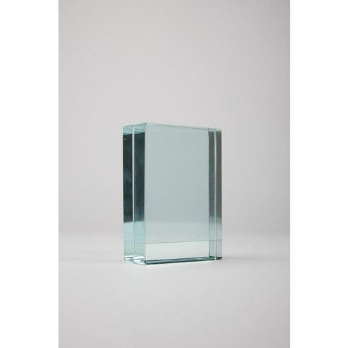 Photo frame made of two thick glass panes with a small mirrored section. Manufactured by fontana arte. Date: 1960....