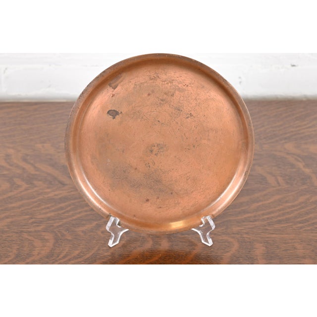 A gorgeous Arts & Crafts period charger plate or tray By Roycroft (signed with impressed orb and cross mark) USA, Early...