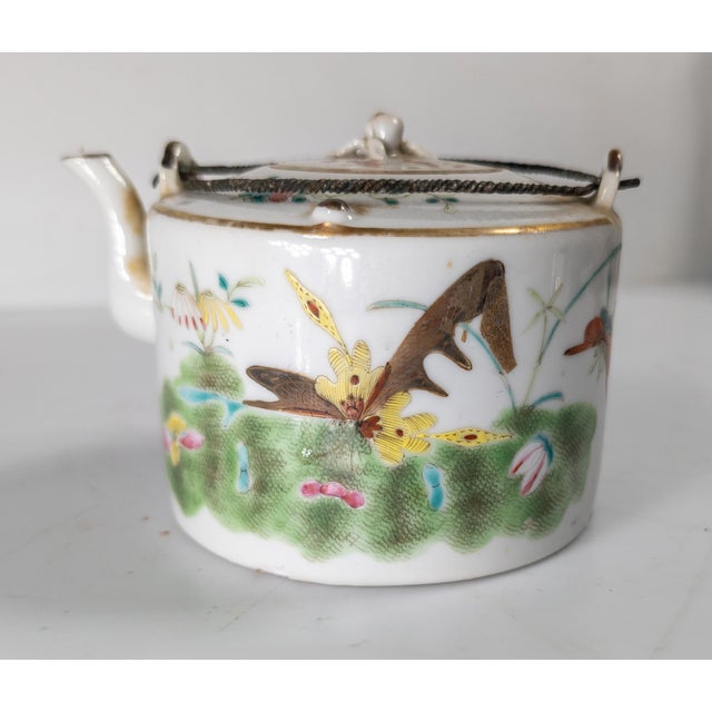 We are selling this nice 19th century Chinese Famille rose decorated teapot. The teapot has decoration of flowers and...