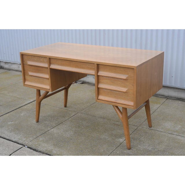 1950s oak desk from Jamestown Lounge Company's "Americana Casual" line designed by Jack Van Der Molen. A stunning desk...