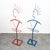 Pair of unique postmodern coat stands from the 1980s / 90s. Made of red and blue lacquered metal. In very good original...