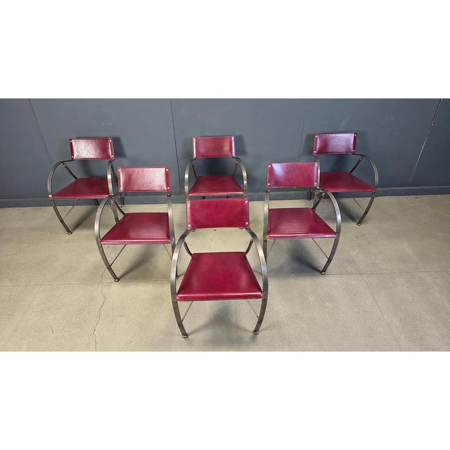 Vintage purple leather dining chairs or armchairs with grey metal frames. Manufactured by Segis Italy, labelled. Good...