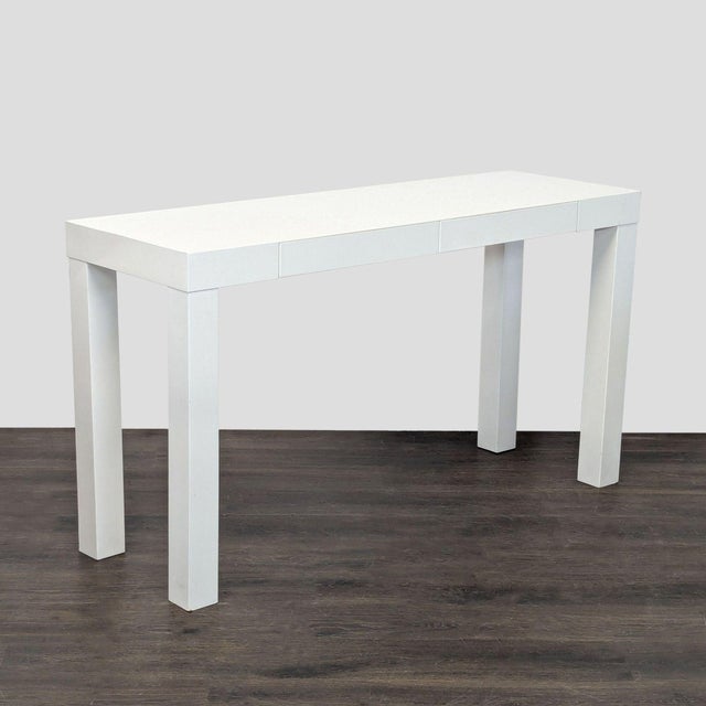 White lacquer. Brand: West Elm. Dimensions (in): 54W x 18D x 30H.