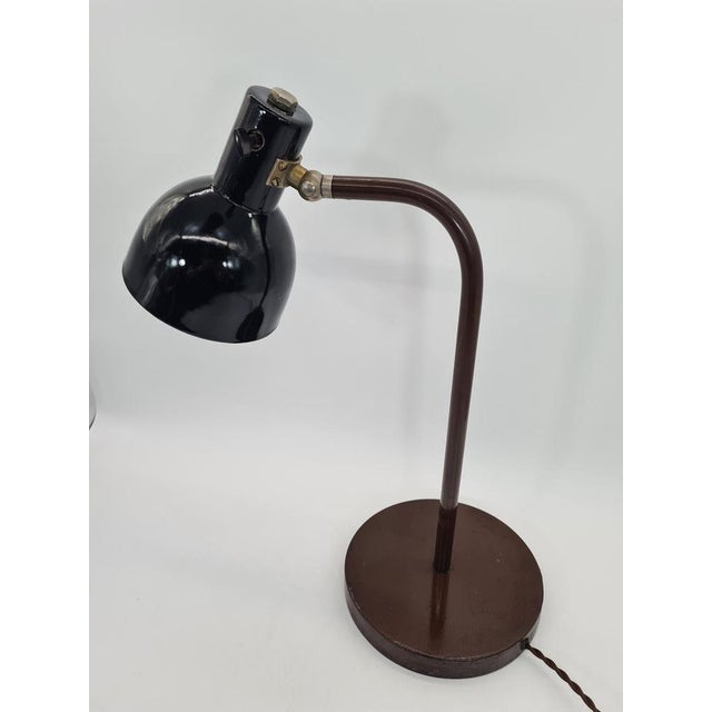 An original desk lamp from east germany (gdr), manufactured in the 1960s. The model is attributed to veb leuchtenbau...