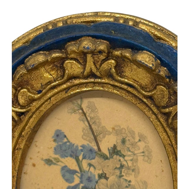 Mid‑20th century European ceramic oval frame in Rococo‑inspired carving, hand‑painted royal blue with antique gold...