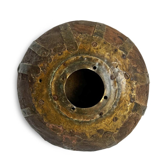 Antique old wooden tobacco container from India. Adorned with brass / metal decorative details. Each is unique and sold...