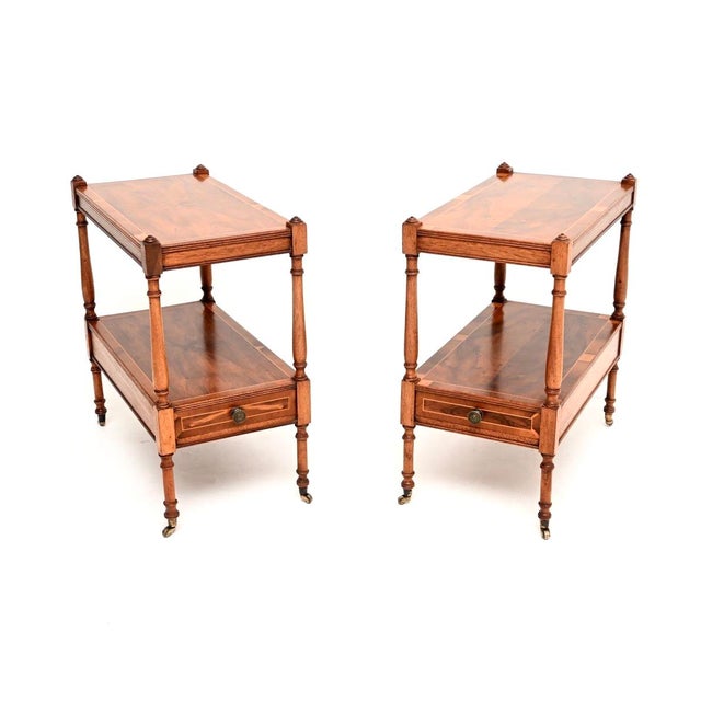 A beautiful pair of antique Georgian style inlaid yew wood side tables. They were made in England, they date from around...