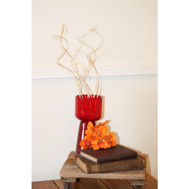 From their Diaz collection in the 1990s, this hand-blown piece was crafted in Mexico and sold at Crate & Barrel. It's red...