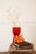From their Diaz collection in the 1990s, this hand-blown piece was crafted in Mexico and sold at Crate & Barrel. It's red...