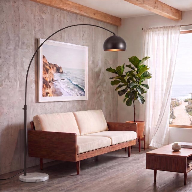 The Half Dome Arc Lamp is a modern arc lamp designed by Peter Morelli in 1960, reflecting NOVA of California's century-...