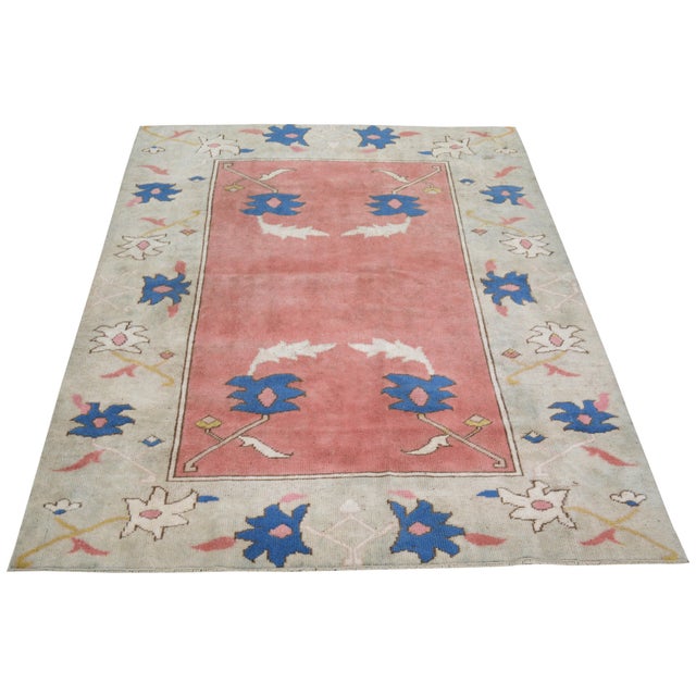 Hand-knotted with care using traditional rug making techniques, this wool rug blends timeless craftsmanship with a modern...