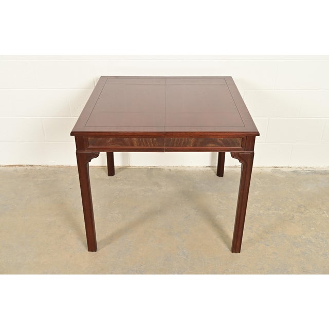 An exceptional Georgian, Chippendale, or Regency style mahogany extension breakfast table, game table, or dining table By...