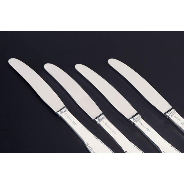 Evald Nielsen lunch knives, set of four. Model number 14. Elegant lunch knives in sterling silver and stainless steel with...