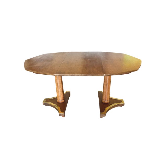 Designed in the Biedermeier style, this 20th Century octagonal extending table was made by Henredon. It is fruitwood and...