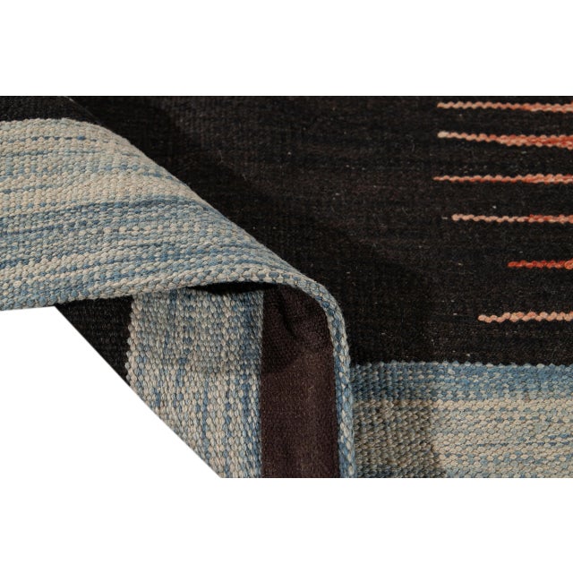 Beautiful Modern flat-weave Kilim Handmade wool rug. This Kilim rug has a field of blue, brown, and orange in a gorgeous...