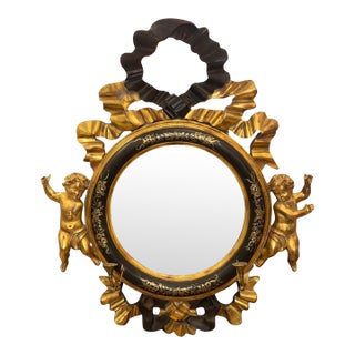 Italian 20th C. Rococo Style Ebonized & Giltwood Mirror W/ Putti & Candle Arms For Sale