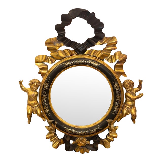 Italian 20th C. Rococo Style Ebonized & Giltwood Mirror W/ Putti & Candle Arms For Sale