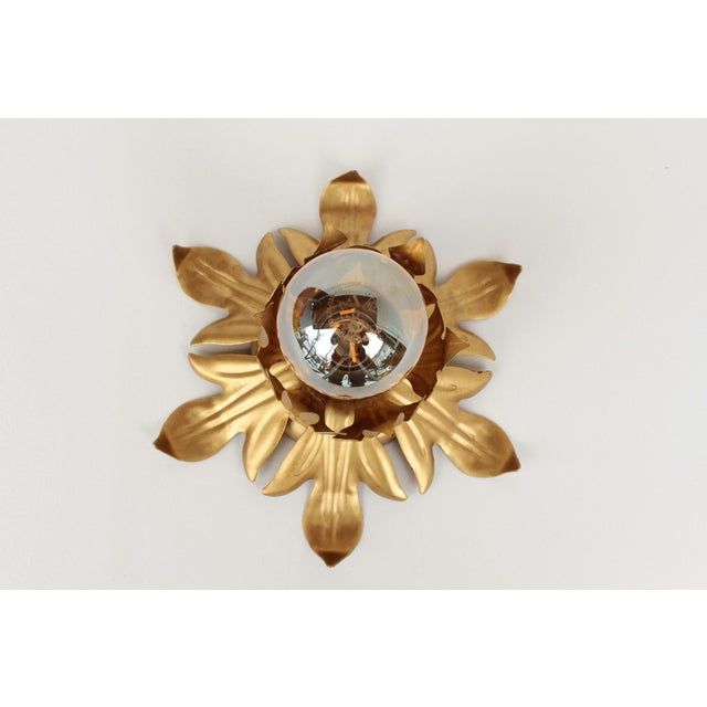 Small wall or ceiling light. gold-plated brass and white metal. made in germany in the 1970s. the light requires one e27...