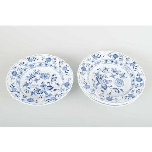 Meissen 4 soup plates, “Blue Onion” pattern. Four hand-painted porcelain soup plates with underglaze blue “Blue Onion”...
