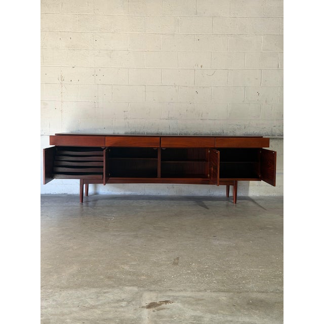 Exceptional vintage Danish mid-century modern sideboard designed by renowned Danish designer Ib Kofod-Larsen and...