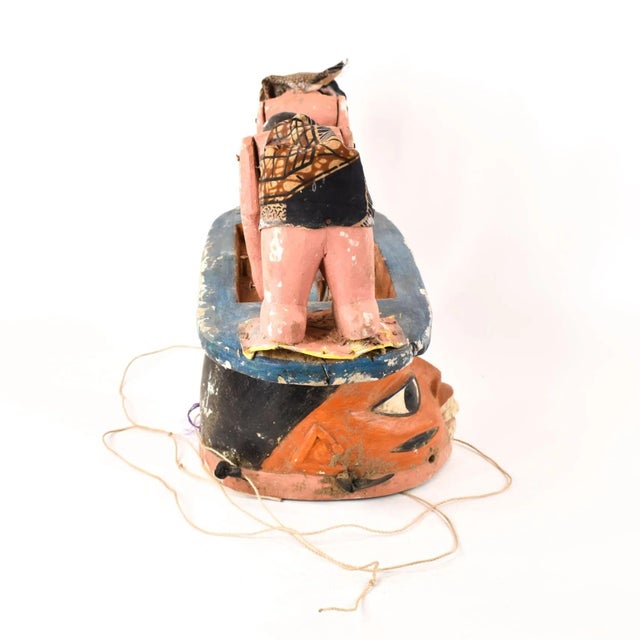 The Gelede mask, originating from the Yoruba people living along the southwestern Nigerian and Beninese border, showcases...