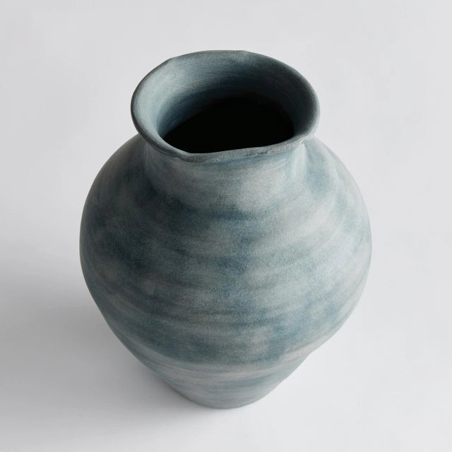 Hand thrown and perfectly imperfect, this terracotta vase brings the character. With subtle horizontal ribbing that shows...