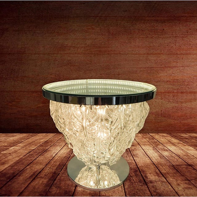 Modern Italian illuminant table with infinity lit mirror, dressed with clear Murano glass leaves mounted on chrome metal...