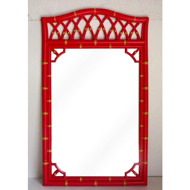 Vintage bamboo style mirror with fretwork details Newly painted in a beautiful satin coral red with gold painted accents...